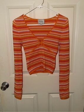 Orange striped sweater top